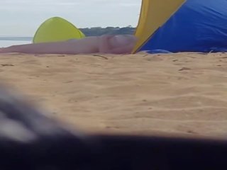 Voluptuous milf spied at beach (please comment)