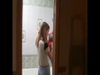 Skinny lady masturbating on the toilet